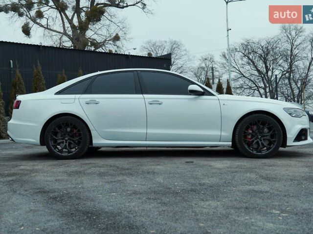 Ауді А6 2014 у Каменце-Подольском на Automoto.ua Білий Ауді А6, об'ємом двигуна 3 л та пробігом 197 тис. км за 14500 $, фото 10 на Automoto.ua