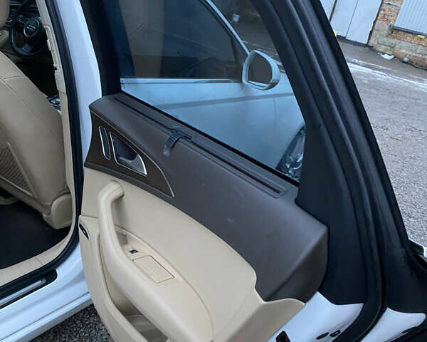 Білий Ауді А6, об'ємом двигуна 2 л та пробігом 235 тис. км за 13500 $, фото 36 на Automoto.ua
