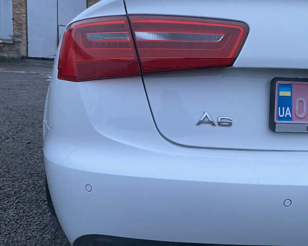 Білий Ауді А6, об'ємом двигуна 2 л та пробігом 235 тис. км за 13500 $, фото 19 на Automoto.ua