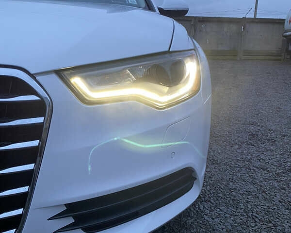 Білий Ауді А6, об'ємом двигуна 2 л та пробігом 235 тис. км за 13500 $, фото 6 на Automoto.ua
