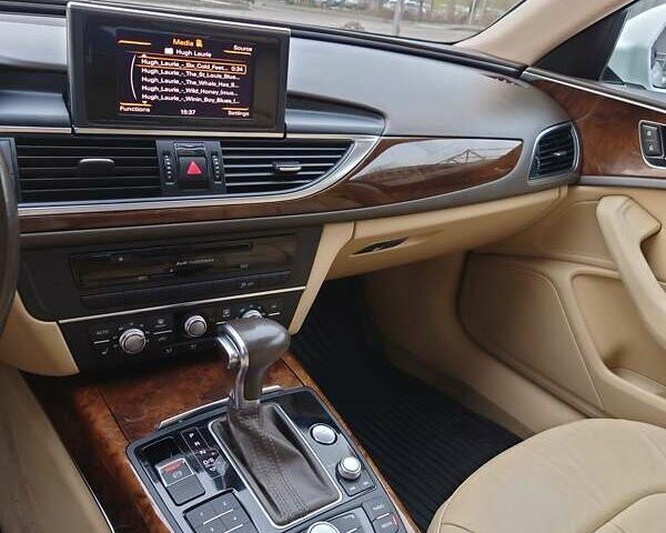 Белый Ауди А6, объемом двигателя 2 л и пробегом 225 тыс. км за 16300 $, фото 1 на Automoto.ua