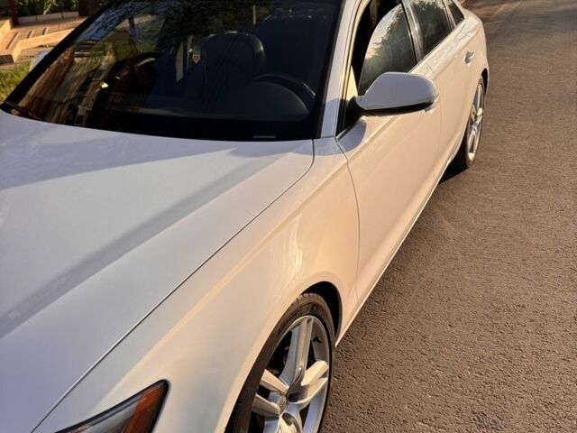 Белый Ауди А6, объемом двигателя 2 л и пробегом 200 тыс. км за 12400 $, фото 1 на Automoto.ua