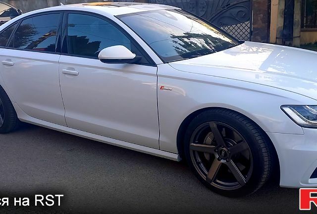 Белый Ауди А6, объемом двигателя 3 л и пробегом 70 тыс. км за 19500 $, фото 1 на Automoto.ua