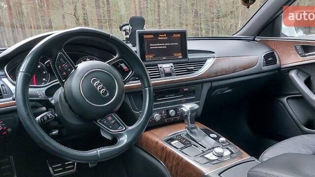 Білий Ауді А6, об'ємом двигуна 1.98 л та пробігом 183 тис. км за 16000 $, фото 13 на Automoto.ua
