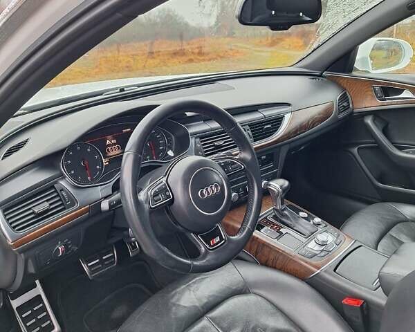Білий Ауді А6, об'ємом двигуна 1.98 л та пробігом 183 тис. км за 16000 $, фото 12 на Automoto.ua