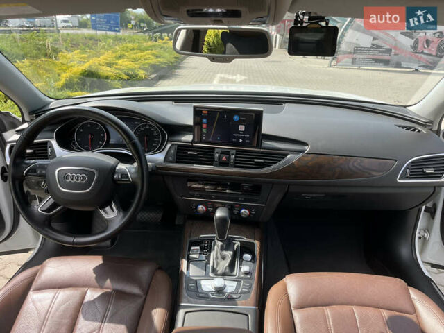Ауді А6 2015 у Ужгороді на Automoto.ua Білий Ауді А6, об'ємом двигуна 1.97 л та пробігом 144 тис. км за 24000 $, фото 9 на Automoto.ua