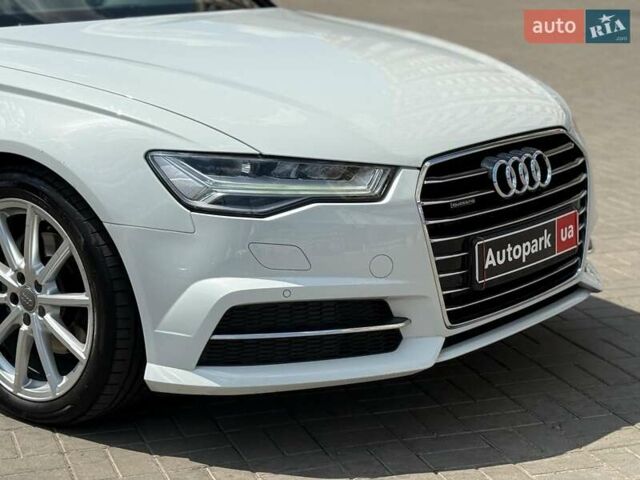 Белый Ауди А6, объемом двигателя 2 л и пробегом 75 тыс. км за 25990 $, фото 1 на Automoto.ua