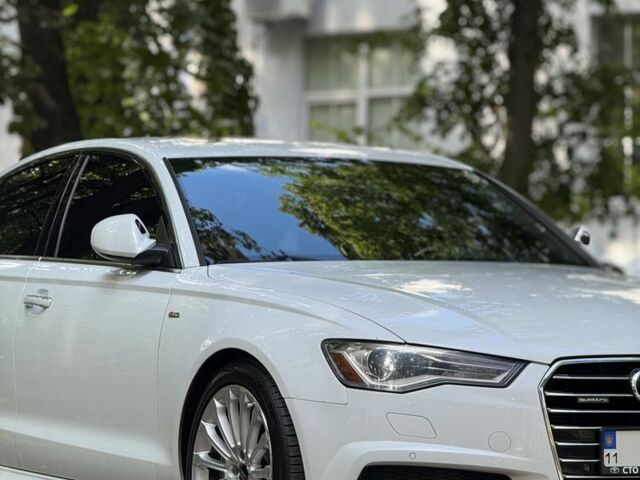 Белый Ауди А6, объемом двигателя 2 л и пробегом 117 тыс. км за 18699 $, фото 2 на Automoto.ua