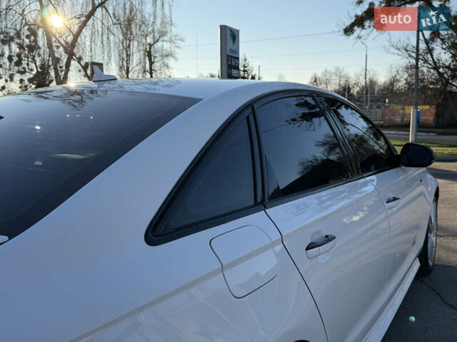 Белый Ауди А6, объемом двигателя 2 л и пробегом 164 тыс. км за 16900 $, фото 23 на Automoto.ua