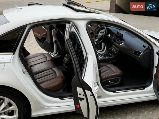 Білий Ауді А6, об'ємом двигуна 2 л та пробігом 122 тис. км за 23800 $, фото 23 на Automoto.ua