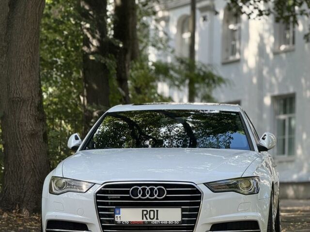 Белый Ауди А6, объемом двигателя 2 л и пробегом 117 тыс. км за 18699 $, фото 1 на Automoto.ua