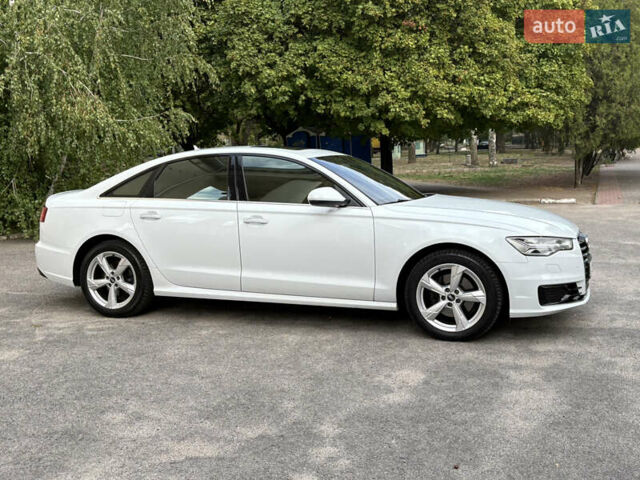 Белый Ауди А6, объемом двигателя 2 л и пробегом 165 тыс. км за 20500 $, фото 4 на Automoto.ua