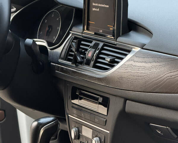 Білий Ауді А6, об'ємом двигуна 2 л та пробігом 122 тис. км за 23800 $, фото 22 на Automoto.ua