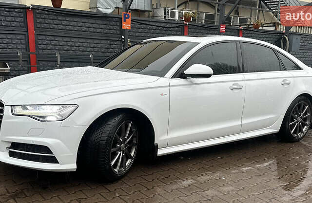 Белый Ауди А6, объемом двигателя 1.97 л и пробегом 162 тыс. км за 24800 $, фото 2 на Automoto.ua