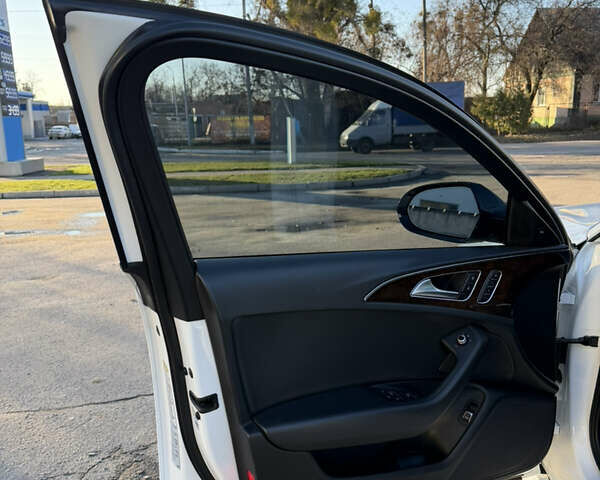 Белый Ауди А6, объемом двигателя 2 л и пробегом 164 тыс. км за 16900 $, фото 24 на Automoto.ua