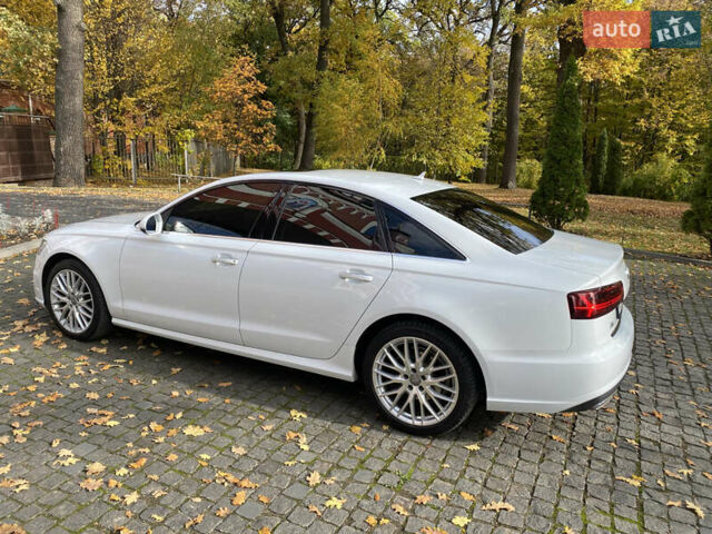 Білий Ауді А6, об'ємом двигуна 2 л та пробігом 143 тис. км за 19900 $, фото 17 на Automoto.ua