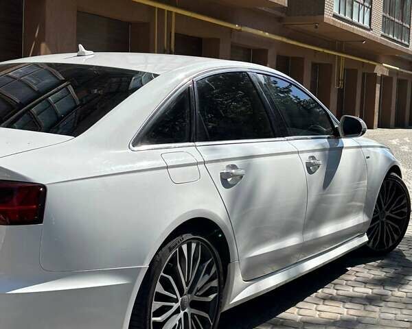 Белый Ауди А6, объемом двигателя 1.98 л и пробегом 128 тыс. км за 18500 $, фото 2 на Automoto.ua