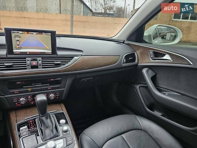 Білий Ауді А6, об'ємом двигуна 2 л та пробігом 120 тис. км за 19900 $, фото 26 на Automoto.ua