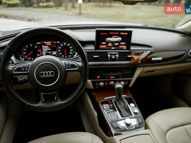 Білий Ауді А6, об'ємом двигуна 1.98 л та пробігом 216 тис. км за 19000 $, фото 48 на Automoto.ua