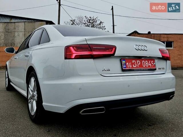 Білий Ауді А6, об'ємом двигуна 2 л та пробігом 120 тис. км за 19900 $, фото 9 на Automoto.ua