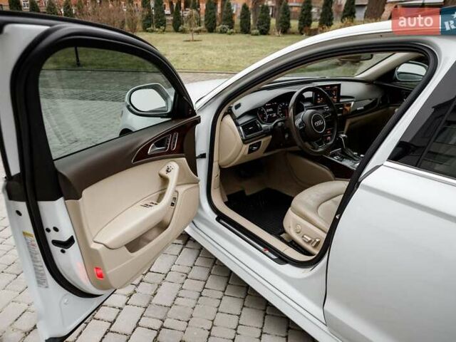 Білий Ауді А6, об'ємом двигуна 1.98 л та пробігом 216 тис. км за 19000 $, фото 26 на Automoto.ua