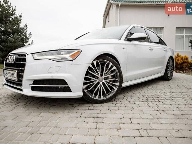 Білий Ауді А6, об'ємом двигуна 1.98 л та пробігом 216 тис. км за 19000 $, фото 1 на Automoto.ua