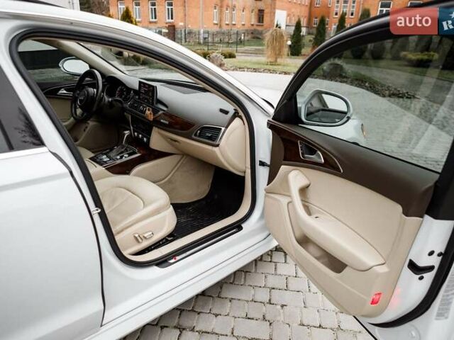 Білий Ауді А6, об'ємом двигуна 1.98 л та пробігом 216 тис. км за 19000 $, фото 34 на Automoto.ua