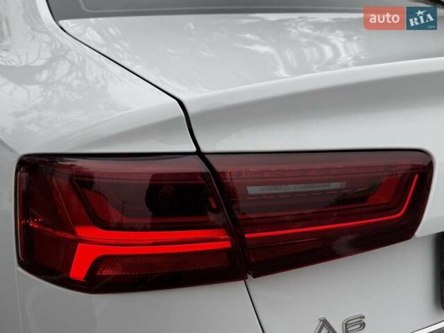 Белый Ауди А6, объемом двигателя 1.98 л и пробегом 135 тыс. км за 19300 $, фото 21 на Automoto.ua