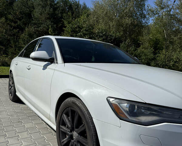 Белый Ауди А6, объемом двигателя 1.98 л и пробегом 200 тыс. км за 12800 $, фото 1 на Automoto.ua