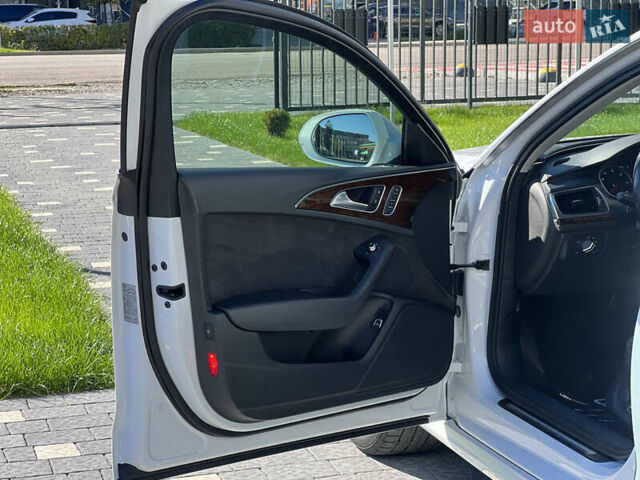 Белый Ауди А6, объемом двигателя 1.8 л и пробегом 95 тыс. км за 18500 $, фото 26 на Automoto.ua