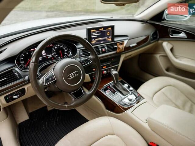 Білий Ауді А6, об'ємом двигуна 1.98 л та пробігом 216 тис. км за 19000 $, фото 29 на Automoto.ua