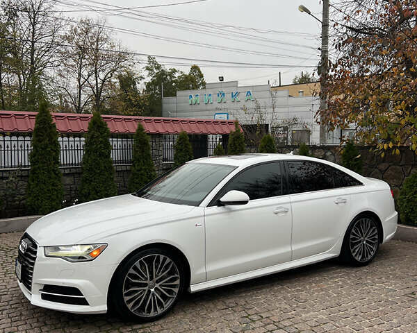 Белый Ауди А6, объемом двигателя 2 л и пробегом 128 тыс. км за 18500 $, фото 2 на Automoto.ua