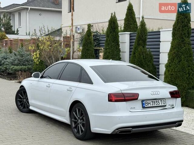 Білий Ауді А6, об'ємом двигуна 2.97 л та пробігом 118 тис. км за 22900 $, фото 32 на Automoto.ua