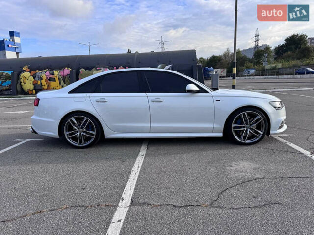 Белый Ауди А6, объемом двигателя 1.98 л и пробегом 203 тыс. км за 18500 $, фото 1 на Automoto.ua