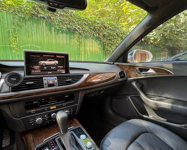 Белый Ауди А6, объемом двигателя 1.98 л и пробегом 128 тыс. км за 18500 $, фото 4 на Automoto.ua