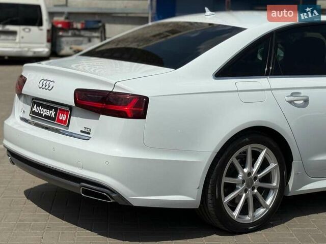 Белый Ауди А6, объемом двигателя 2 л и пробегом 75 тыс. км за 25990 $, фото 4 на Automoto.ua