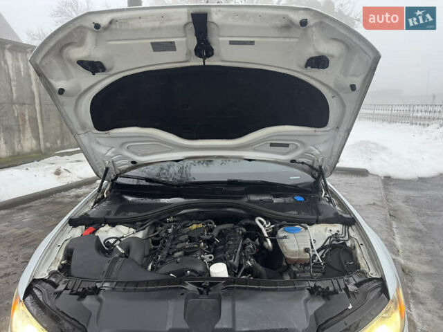 Білий Ауді А6, об'ємом двигуна 2 л та пробігом 160 тис. км за 13950 $, фото 40 на Automoto.ua