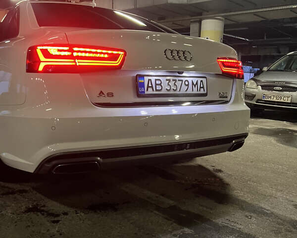Белый Ауди А6, объемом двигателя 1.98 л и пробегом 130 тыс. км за 18900 $, фото 22 на Automoto.ua