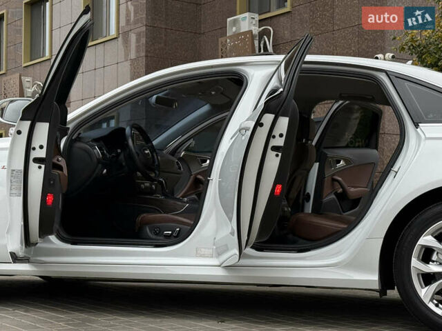 Білий Ауді А6, об'ємом двигуна 2 л та пробігом 122 тис. км за 23800 $, фото 32 на Automoto.ua