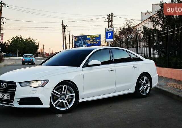 Белый Ауди А6, объемом двигателя 1.98 л и пробегом 113 тыс. км за 13700 $, фото 2 на Automoto.ua