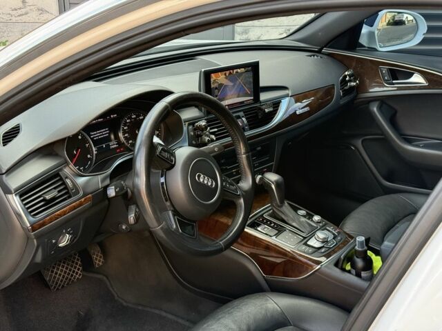 Білий Ауді А6, об'ємом двигуна 2 л та пробігом 270 тис. км за 12496 $, фото 10 на Automoto.ua