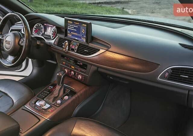 Белый Ауди А6, объемом двигателя 1.98 л и пробегом 113 тыс. км за 13700 $, фото 3 на Automoto.ua