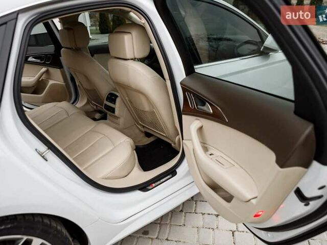 Білий Ауді А6, об'ємом двигуна 1.98 л та пробігом 216 тис. км за 19000 $, фото 36 на Automoto.ua