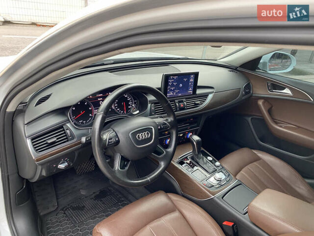 Белый Ауди А6, объемом двигателя 2 л и пробегом 165 тыс. км за 20300 $, фото 32 на Automoto.ua