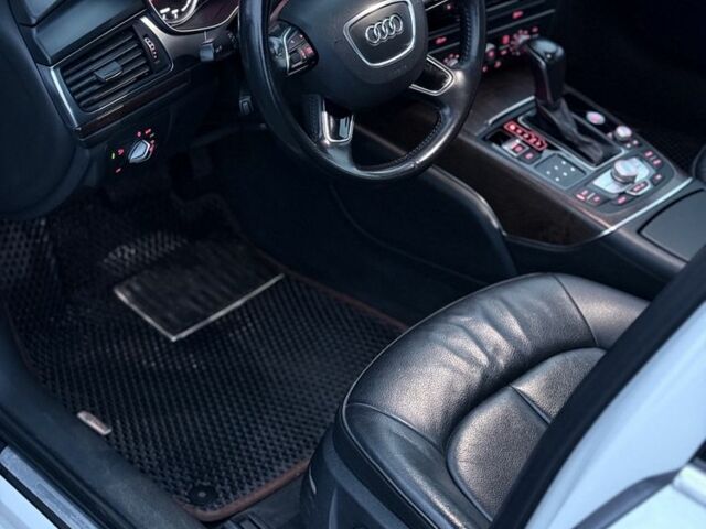 Белый Ауди А6, объемом двигателя 2 л и пробегом 208 тыс. км за 25900 $, фото 1 на Automoto.ua