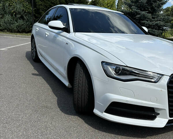 Белый Ауди А6, объемом двигателя 1.98 л и пробегом 127 тыс. км за 19700 $, фото 3 на Automoto.ua