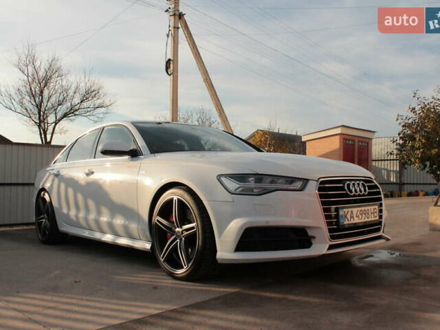 Белый Ауди А6, объемом двигателя 1.98 л и пробегом 65 тыс. км за 22500 $, фото 2 на Automoto.ua