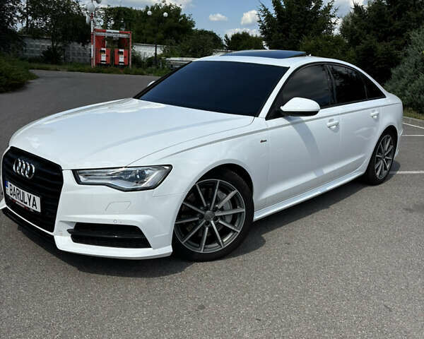 Белый Ауди А6, объемом двигателя 1.98 л и пробегом 127 тыс. км за 19700 $, фото 1 на Automoto.ua