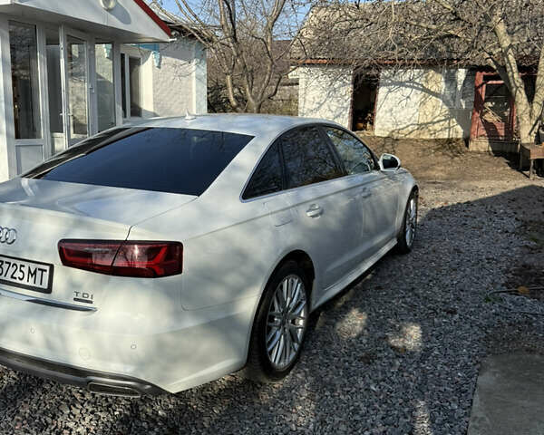 Белый Ауди А6, объемом двигателя 1.97 л и пробегом 75 тыс. км за 29500 $, фото 1 на Automoto.ua