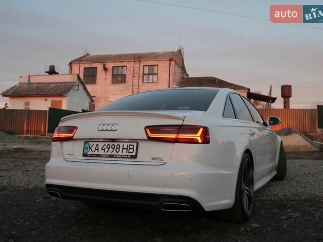 Белый Ауди А6, объемом двигателя 1.98 л и пробегом 65 тыс. км за 22500 $, фото 7 на Automoto.ua